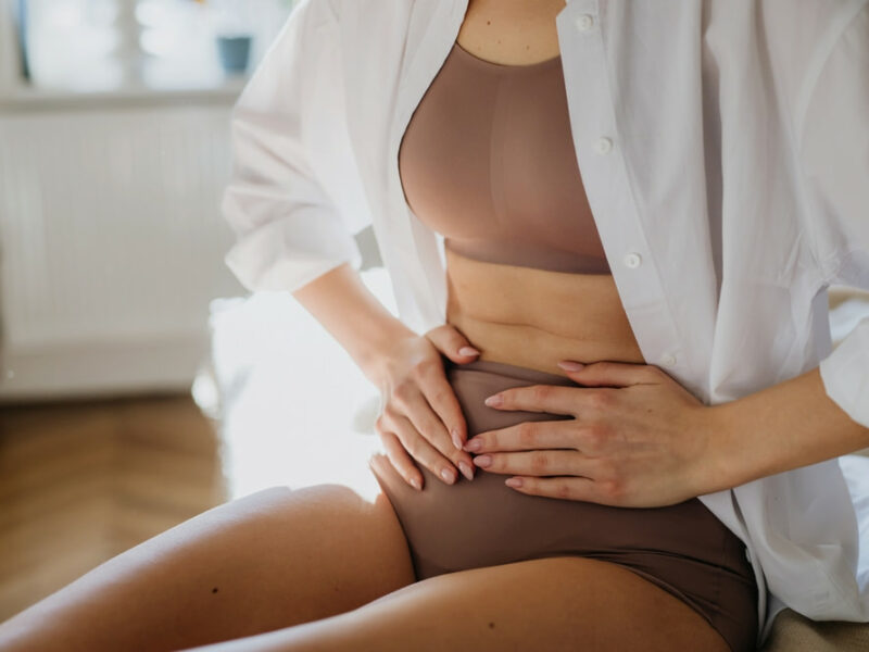A woman suffering from adenomyosis symptoms