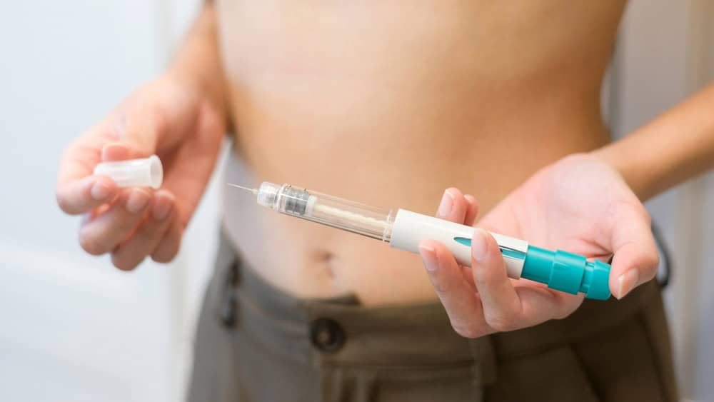 Doctor adjusting ovulation stimulation to improve IUI success